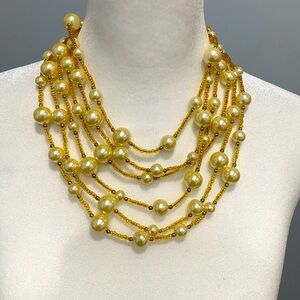 Woman necklace multi strands pearls and gold beads- Carolee designer.